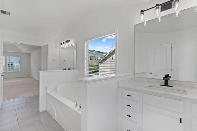 a bathroom with a sink and a bathtub