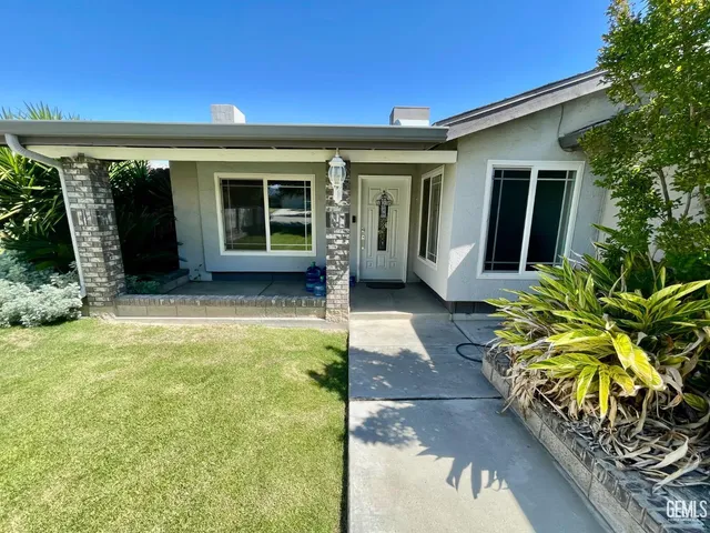 a front view of a house with a porch