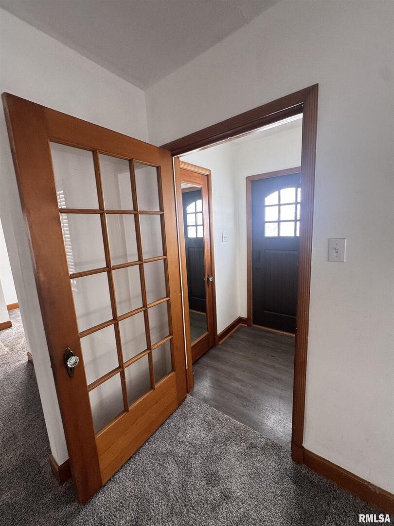 602 Washington Avenue Lowden, IA 52255 - Photo 4 of 28 an empty room with windows