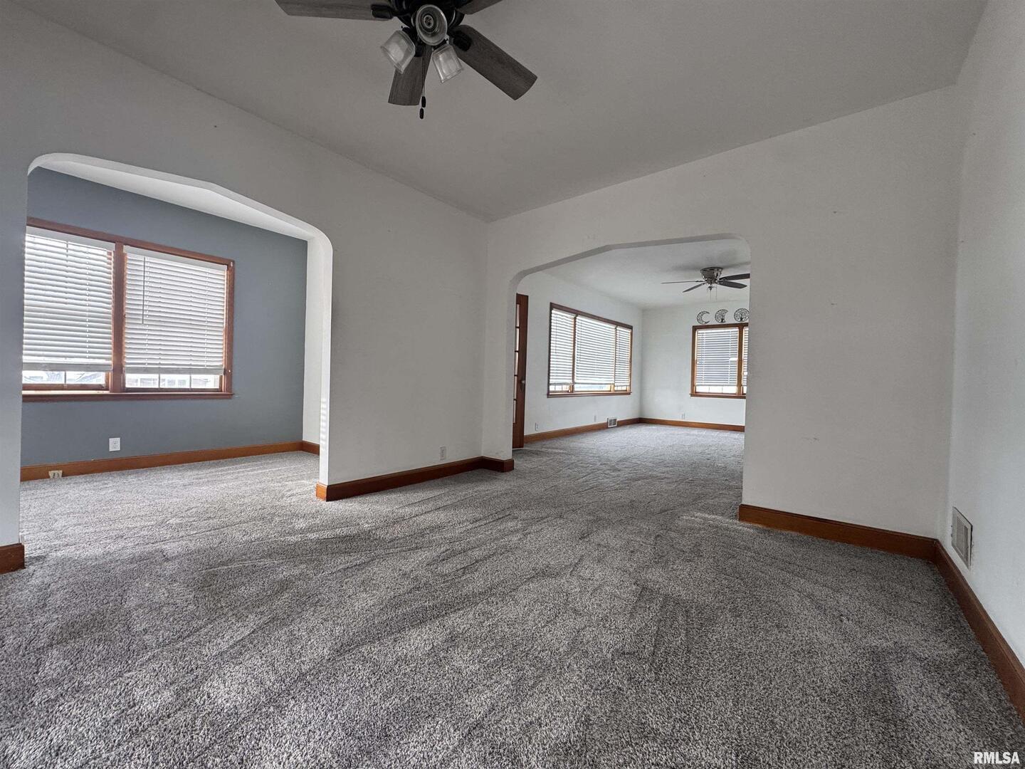 602 Washington Avenue Lowden, IA 52255 - Photo 7 of 28 a view of an empty room with a window