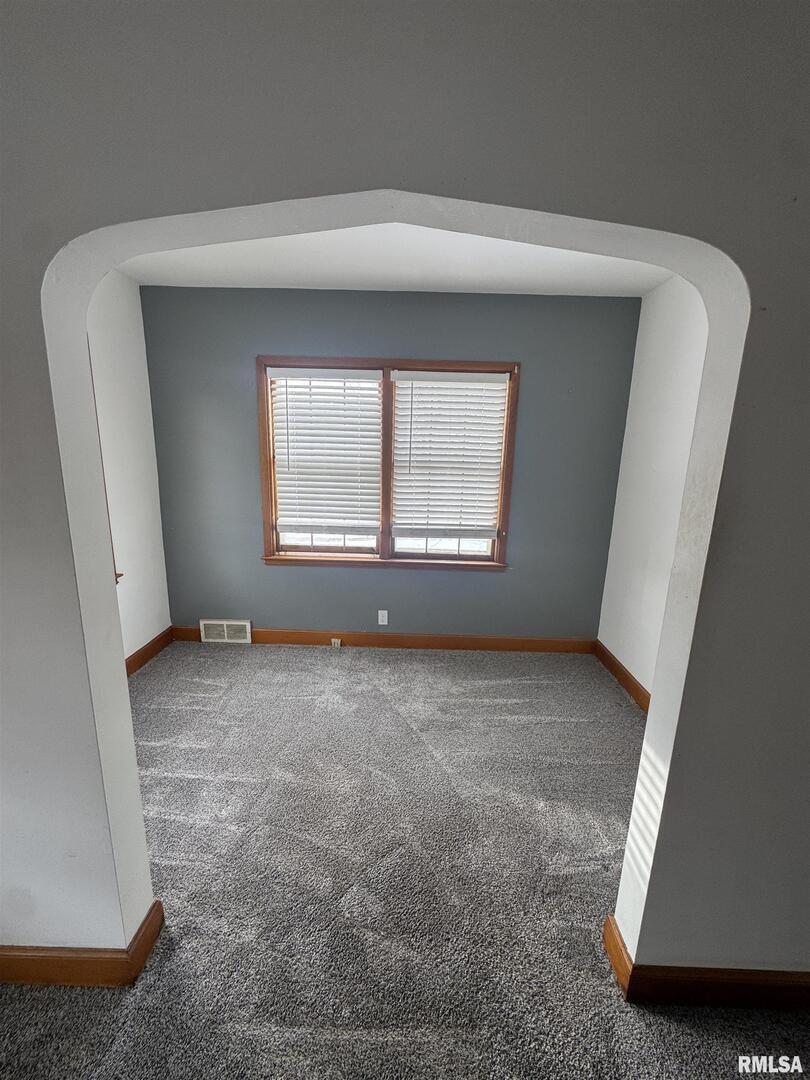 602 Washington Avenue Lowden, IA 52255 - Photo 9 of 28 a view of an empty room with a window