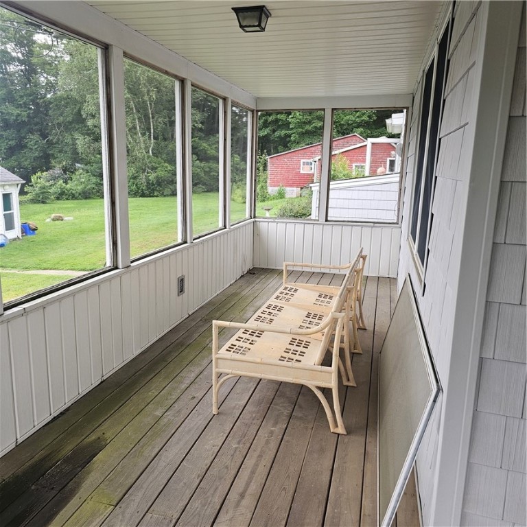 402 Fairview Avenue Coventry, RI 02816 - Photo 4 of 22 Screened in wrap around porch