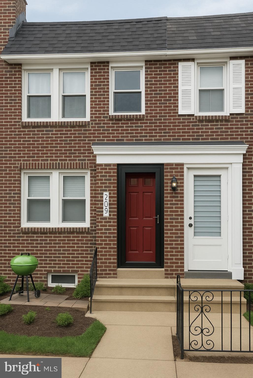209 Glendale Road Upper Darby, PA 19082 - Photo 15 of 17 a front view of a house with a bench
