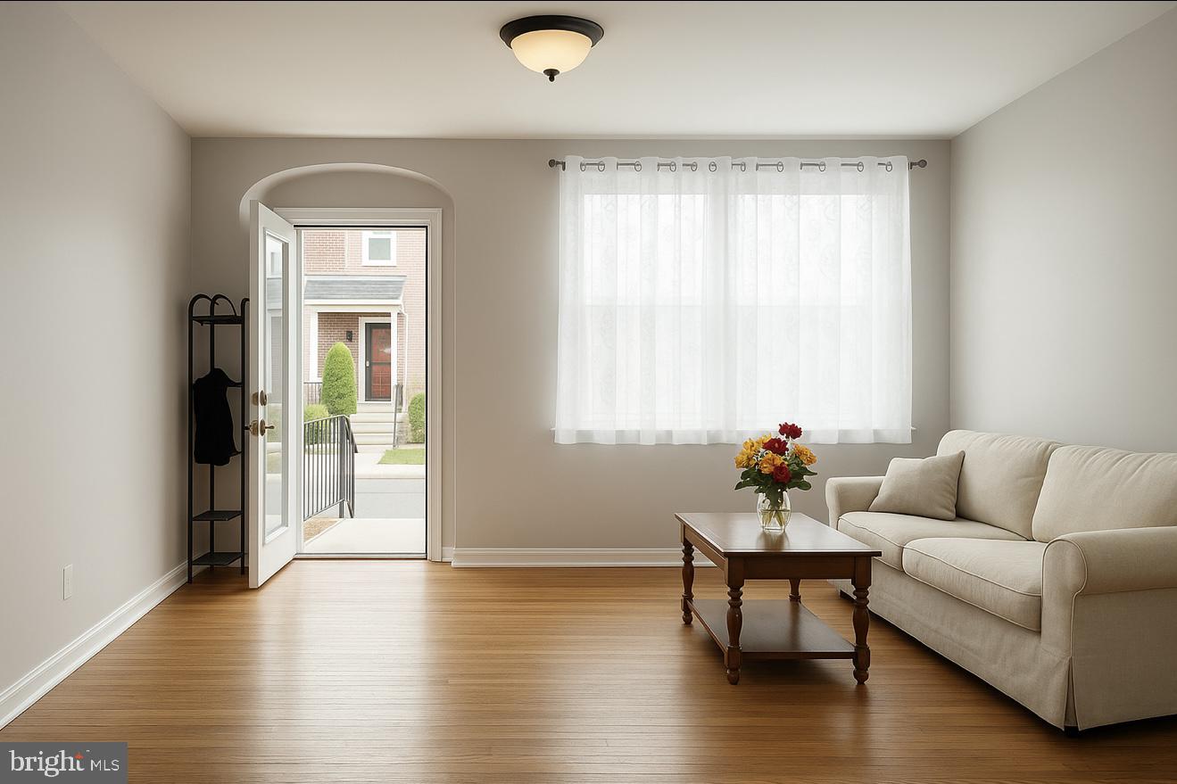 209 Glendale Road Upper Darby, PA 19082 - Photo 2 of 17 a living room with furniture and wooden floor