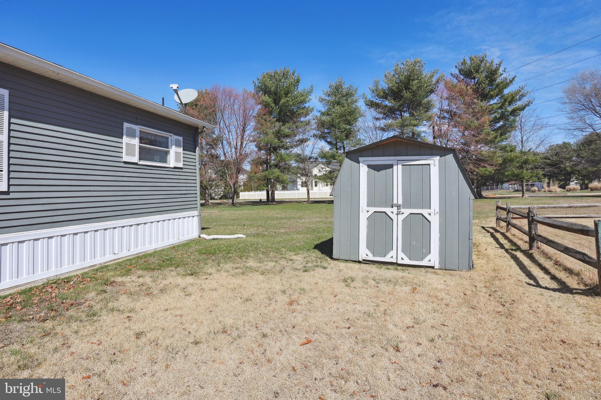 1122 Lemur Lane Mount Laurel, NJ 08054 - Photo 17 of 18 a view of a house with backyard and trees
