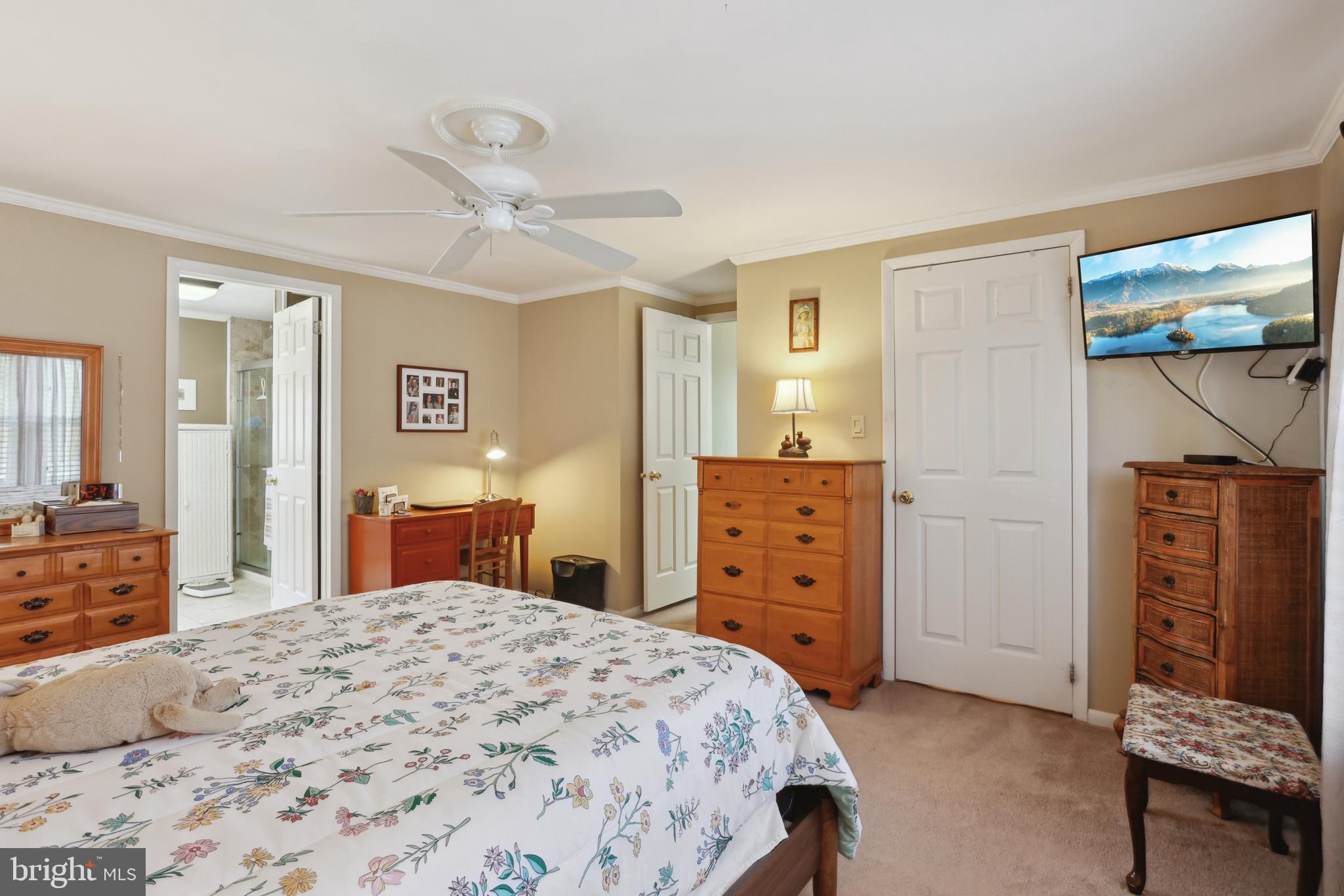 1122 Lemur Lane Mount Laurel, NJ 08054 - Photo 10 of 18 a bedroom with a bed and a dresser