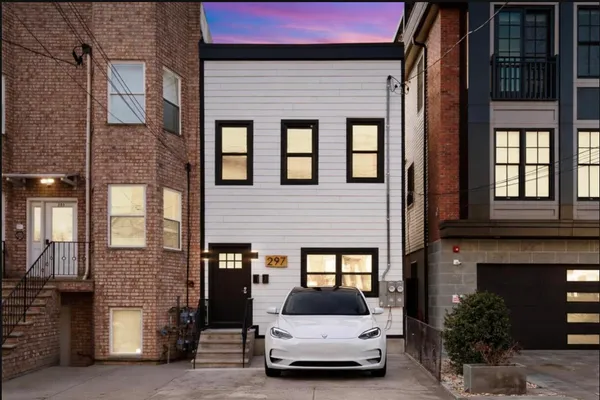 a car parked in front of a building