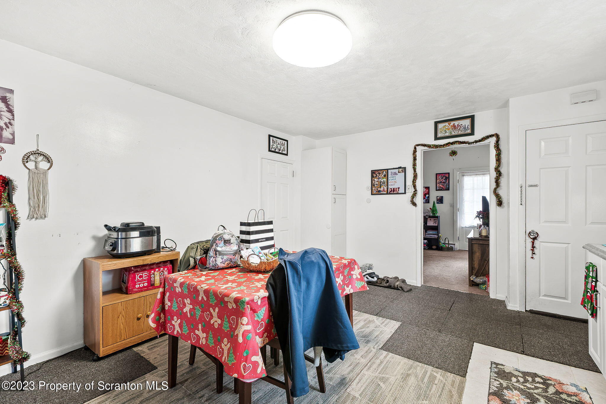 1023 Mark Avenue Scranton, PA 18510 - Photo 13 of 23 a bedroom with furniture and a chandelier
