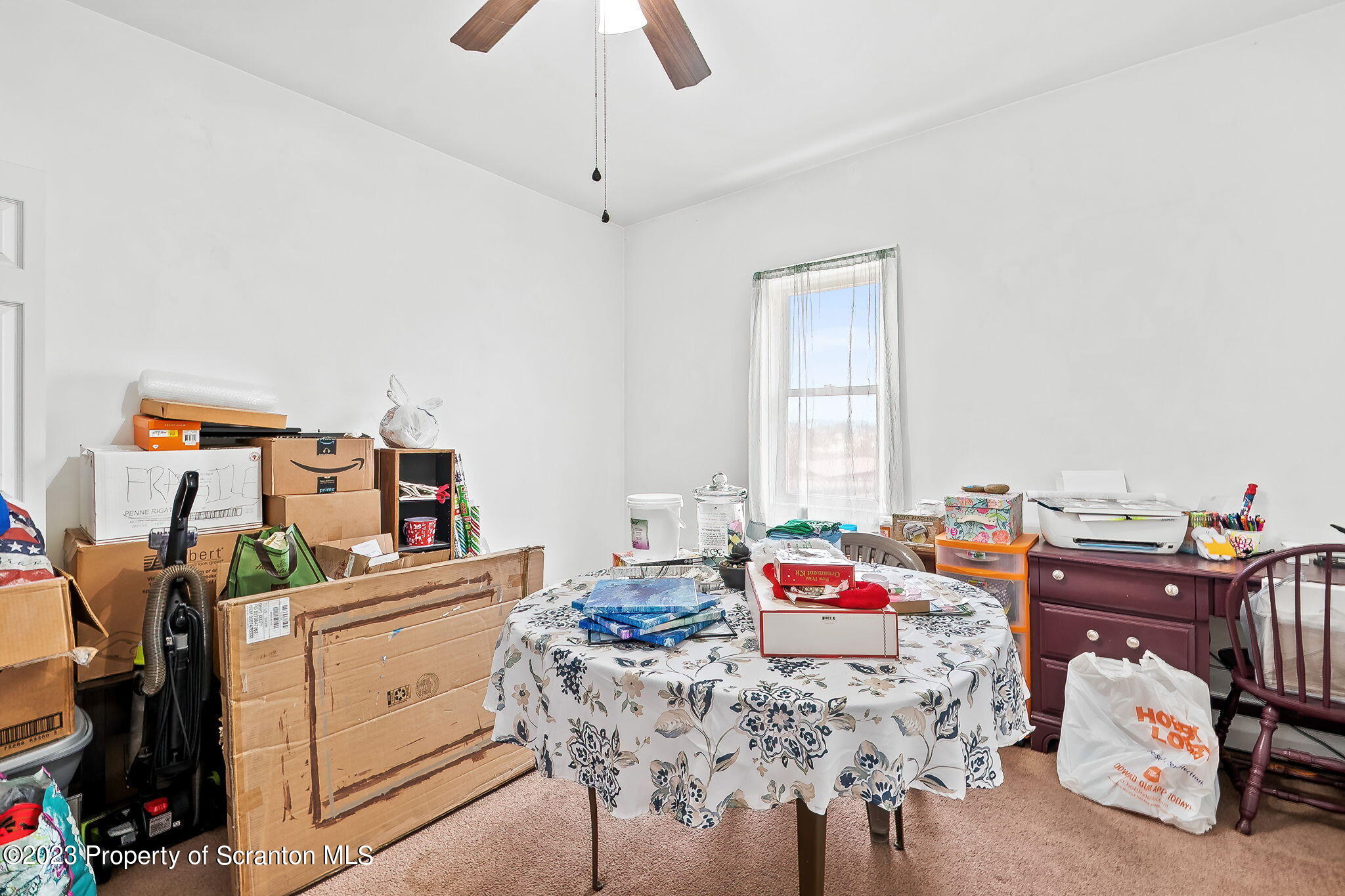 1023 Mark Avenue Scranton, PA 18510 - Photo 17 of 23 a living room with furniture and a baby crib