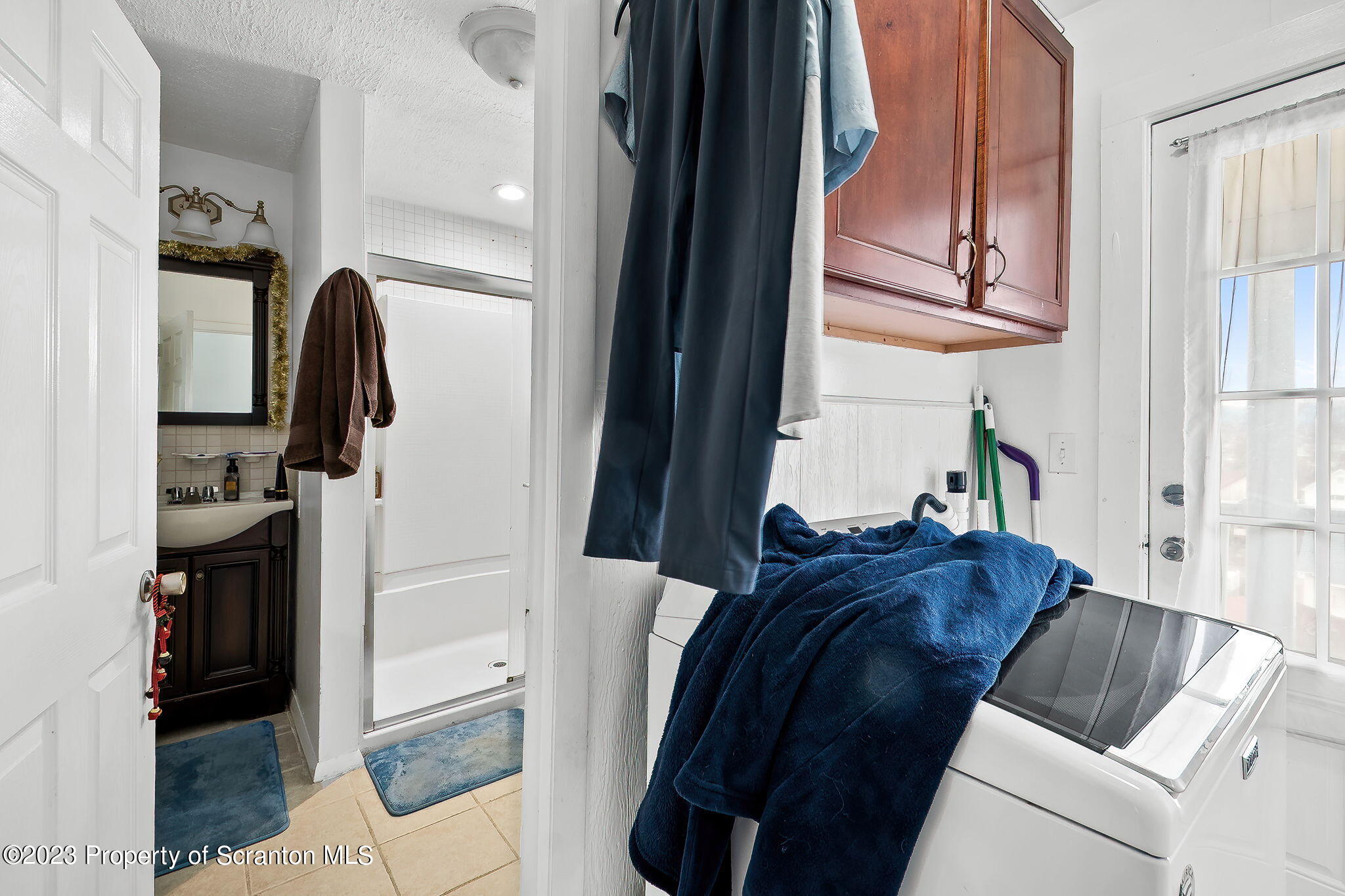 1023 Mark Avenue Scranton, PA 18510 - Photo 19 of 23 a living room with furniture and a painting on the wall