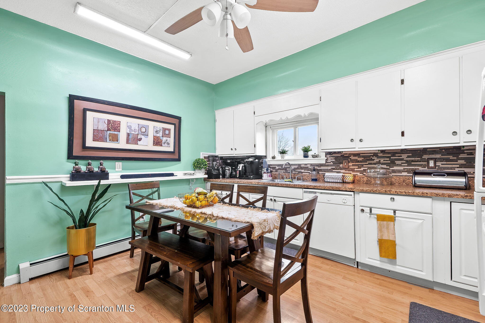 1023 Mark Avenue Scranton, PA 18510 - Photo 6 of 23 a view of a dining room with furniture and wooden floor
