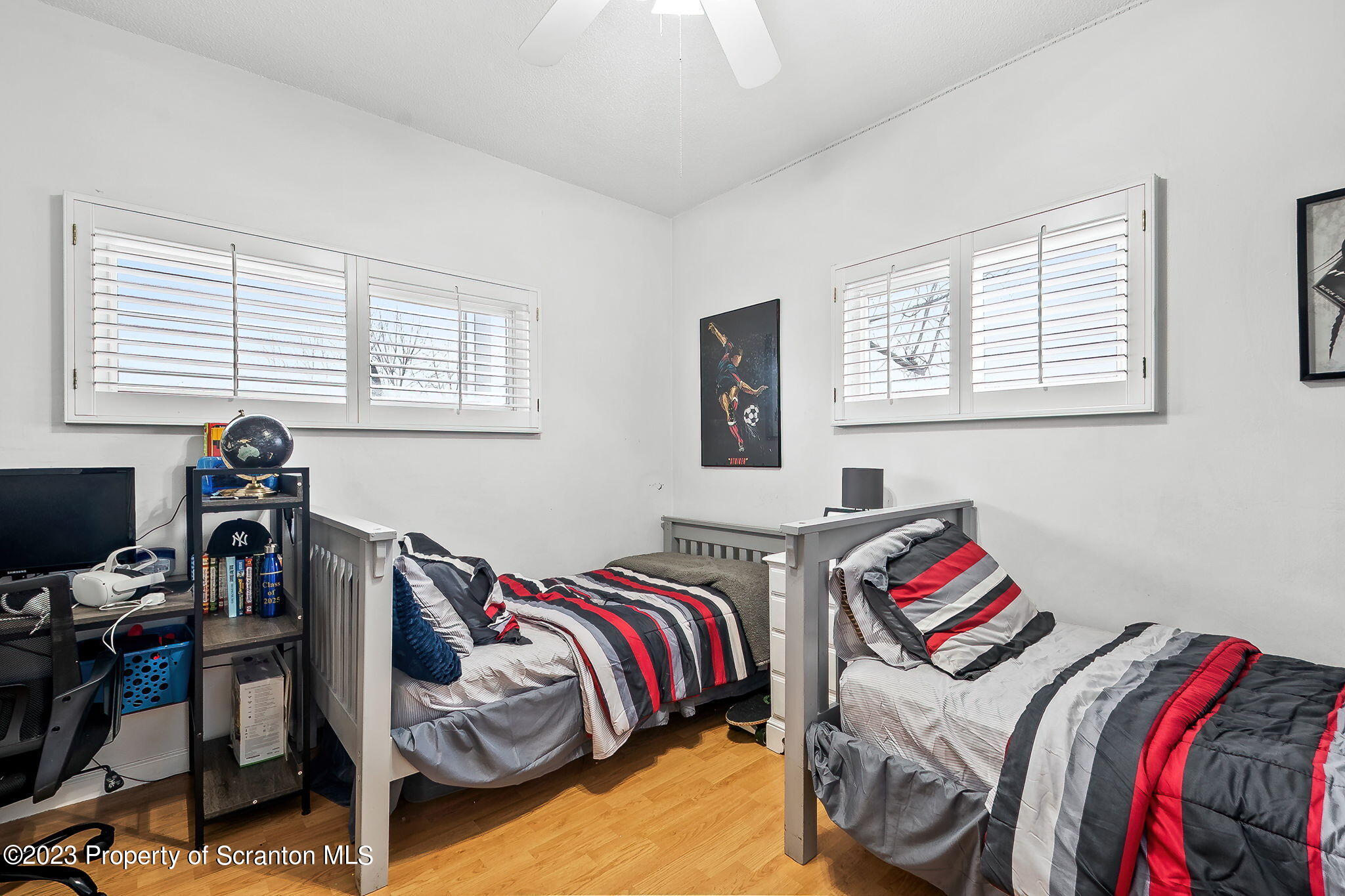 1023 Mark Avenue Scranton, PA 18510 - Photo 8 of 23 a bedroom with a bed and a window