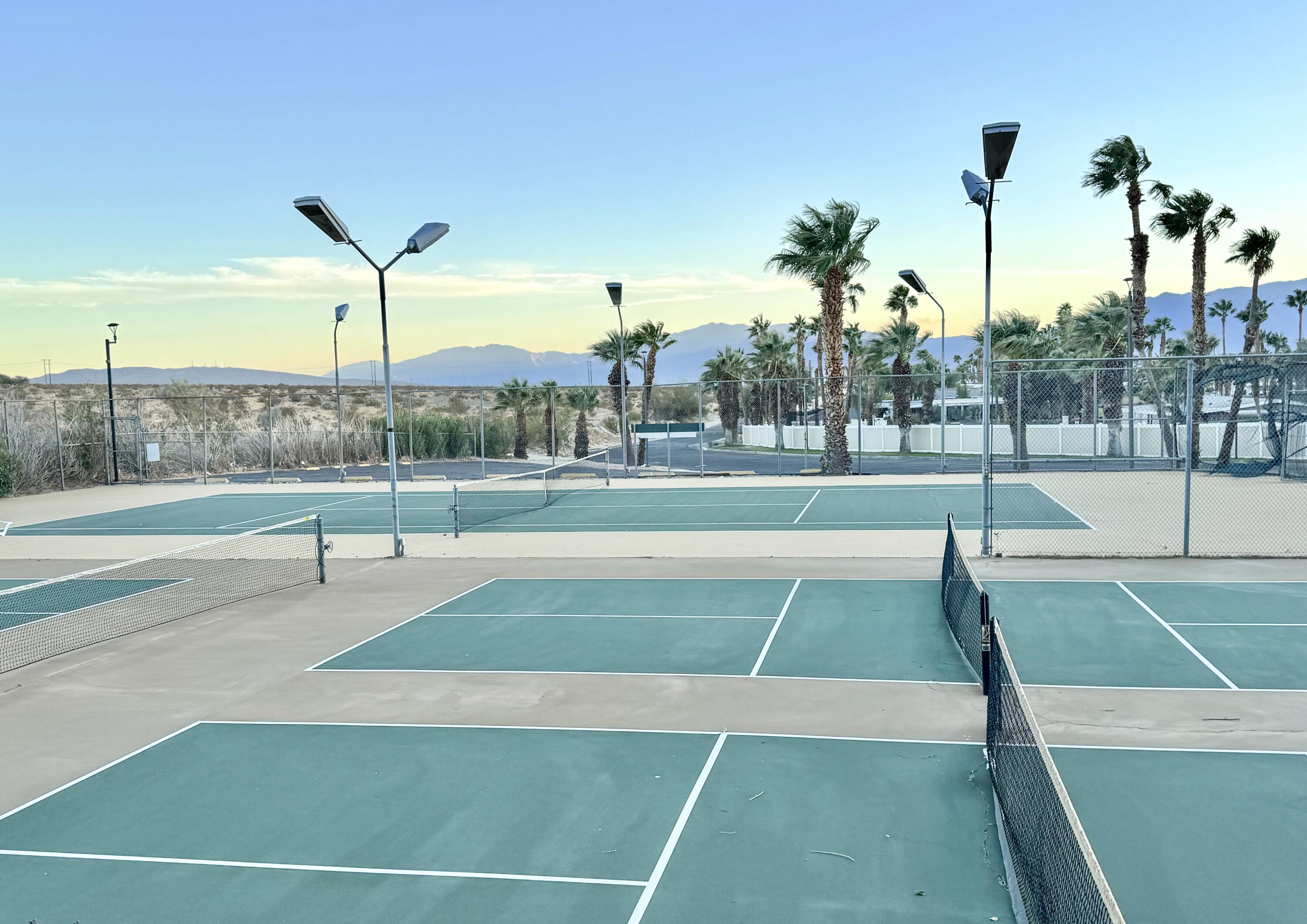 15500 Bubbling Wells Road, Unit 243 Desert Hot Springs, CA 92240 - Photo 37 of 39 a tennis court view
