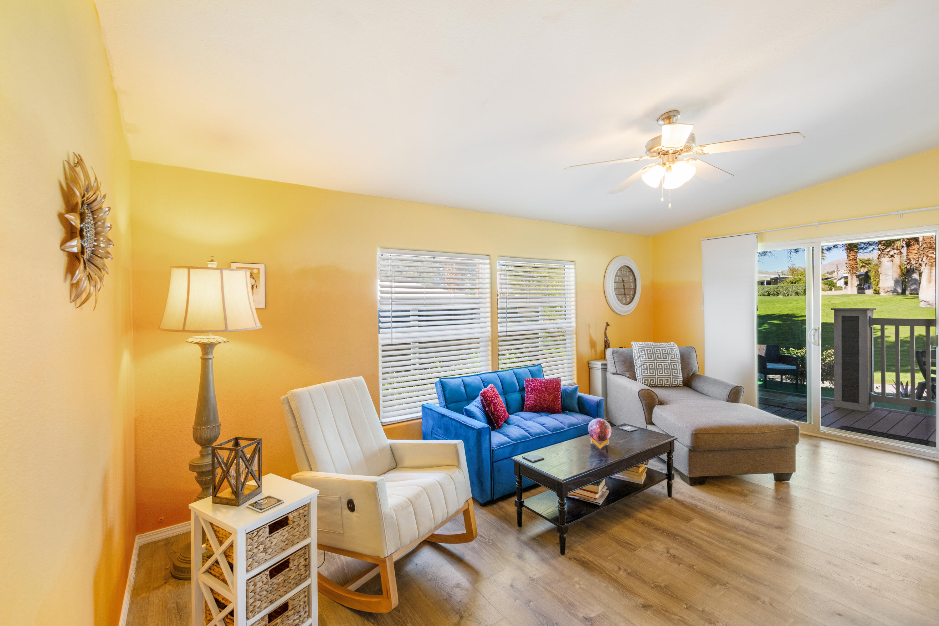 15500 Bubbling Wells Road, Unit 243 Desert Hot Springs, CA 92240 - Photo 7 of 39 a living room with furniture and wooden floor