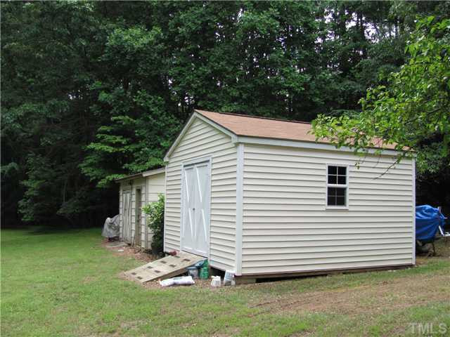 7218 Kemp Road Raleigh, NC 27613 - Photo 10 of 23 THERE ARE THREE STORAGE BUILDINGS ON THIS LOT ONE WIRED FOR WORK SHOP. Workshop