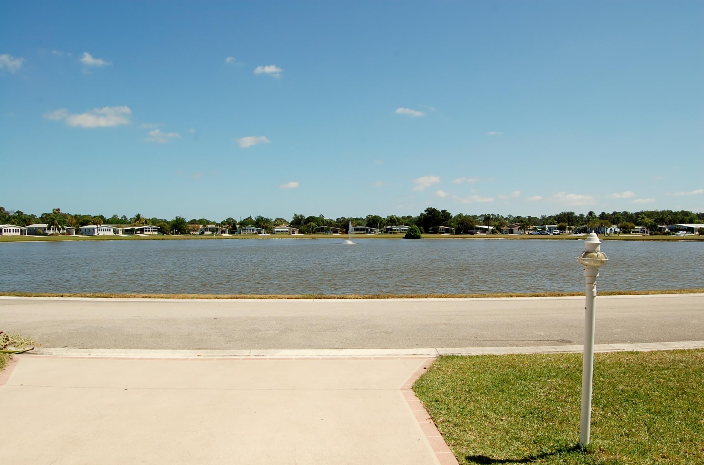 8973 Southwest Chevy Circle Stuart, FL 34997 - Photo 18 of 30 View of Lake
