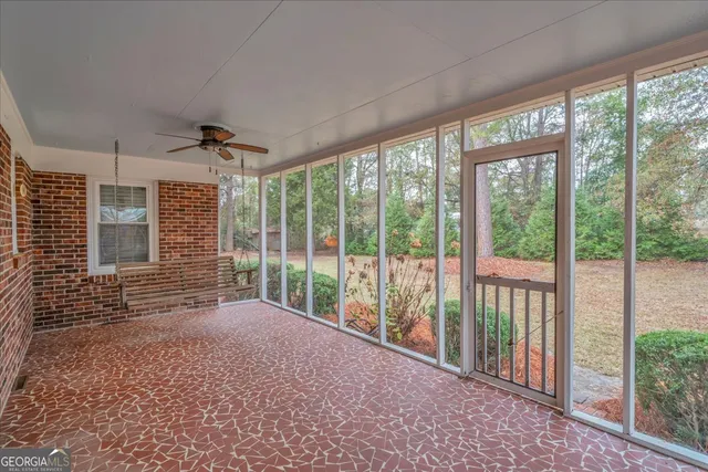 a view of a room with windows