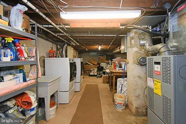 a view of a swimming pool with a yard and trees