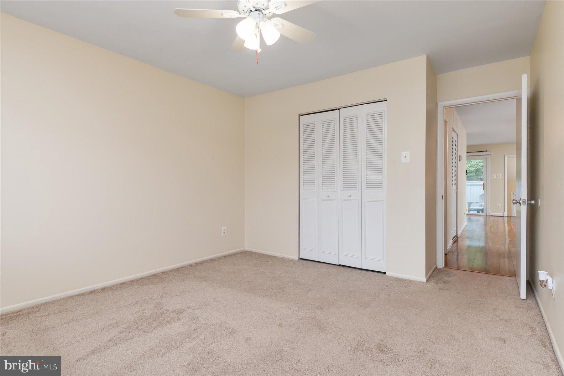 1914 Ardenwood Terrace Crofton, MD 21114 - Photo 23 of 34 an empty room with a chandelier fan