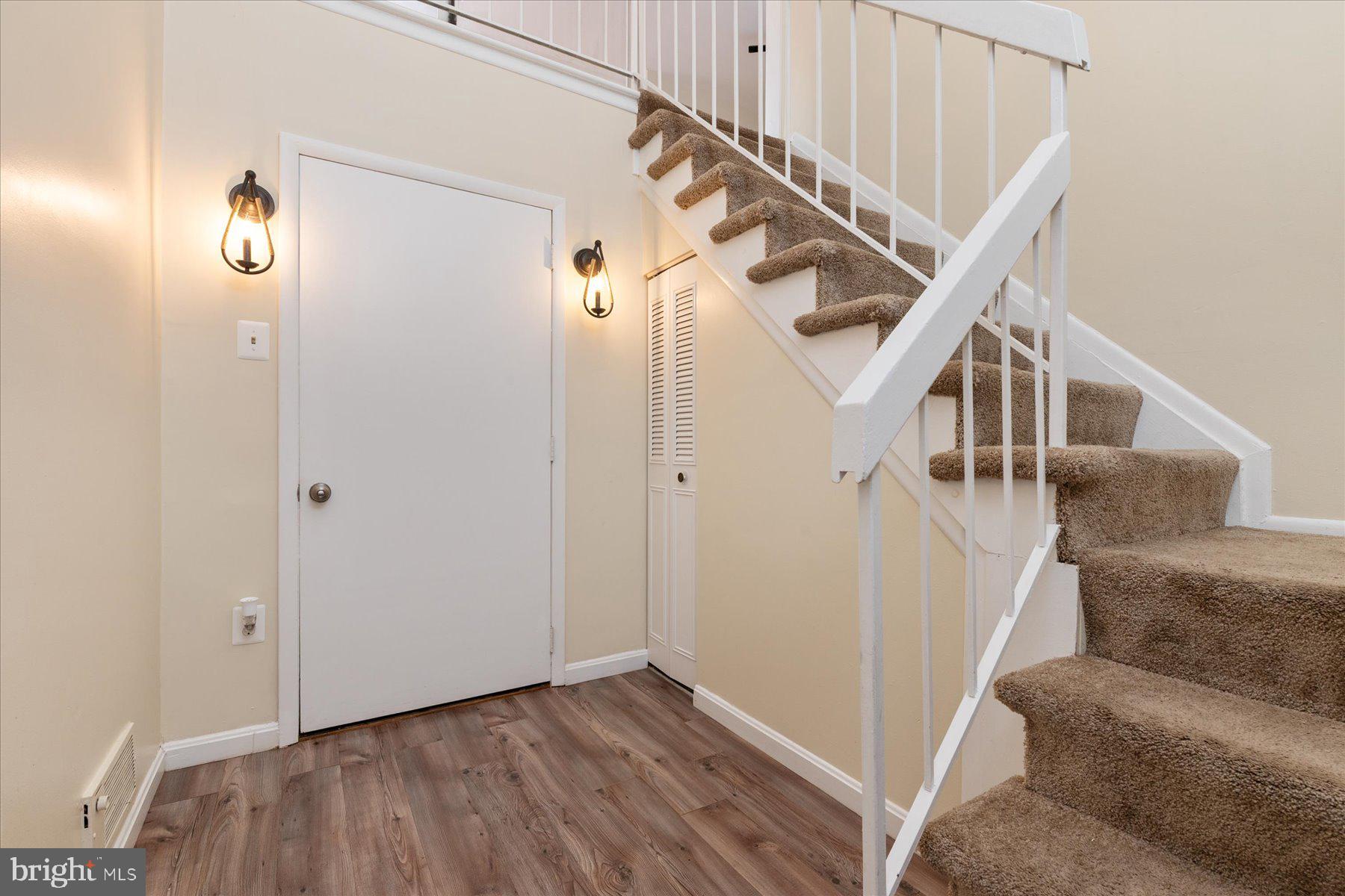 1914 Ardenwood Terrace Crofton, MD 21114 - Photo 3 of 34 a view of entryway and hall with wooden floor
