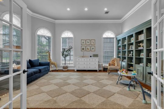 8723 Kennet Valley Road Spring, TX 77379 - Photo 15 of 38 a living room with furniture and a large window