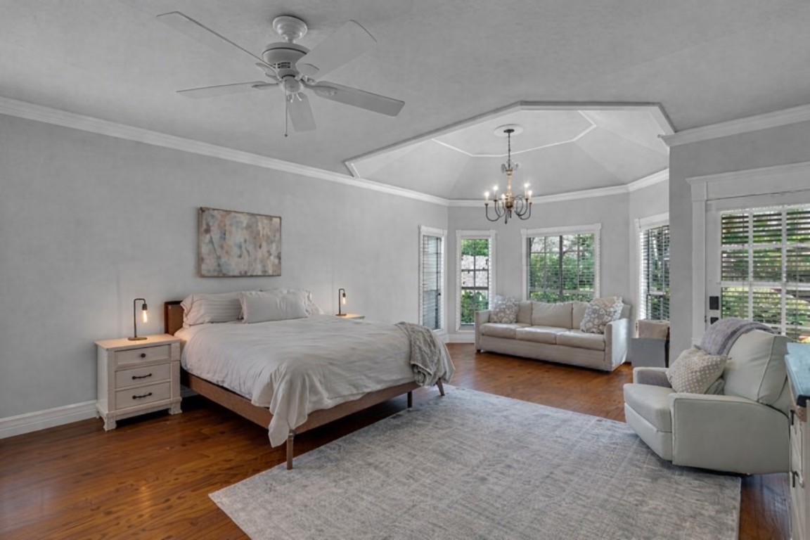 8723 Kennet Valley Road Spring, TX 77379 - Photo 17 of 38 a spacious bedroom with a bed couch and a window