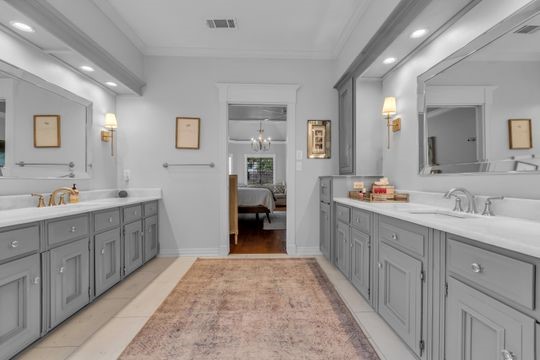 8723 Kennet Valley Road Spring, TX 77379 - Photo 18 of 38 a spacious bathroom with a double vanity sink double and mirror