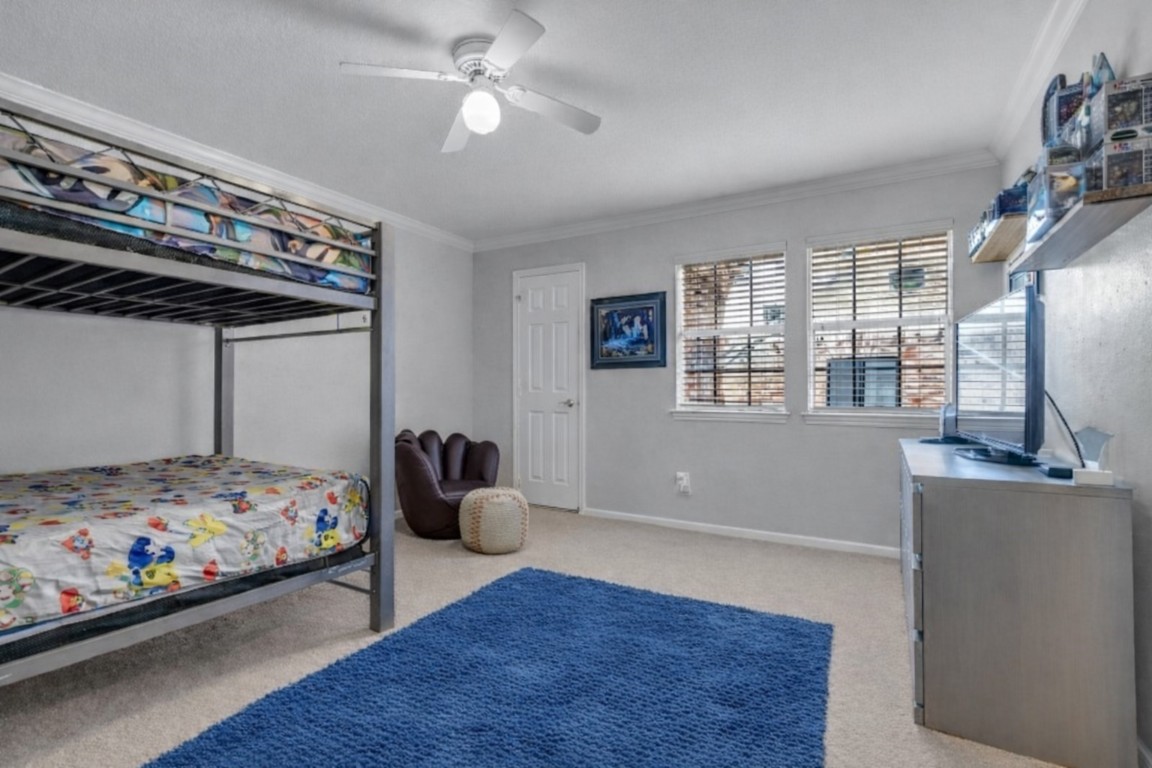 8723 Kennet Valley Road Spring, TX 77379 - Photo 24 of 38 a bedroom with bed and wooden floor