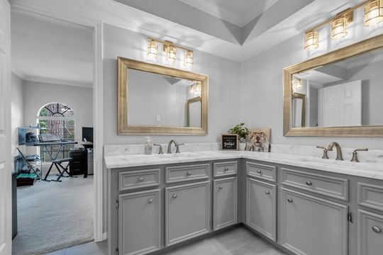 8723 Kennet Valley Road Spring, TX 77379 - Photo 25 of 38 a bathroom with a sink and a mirror