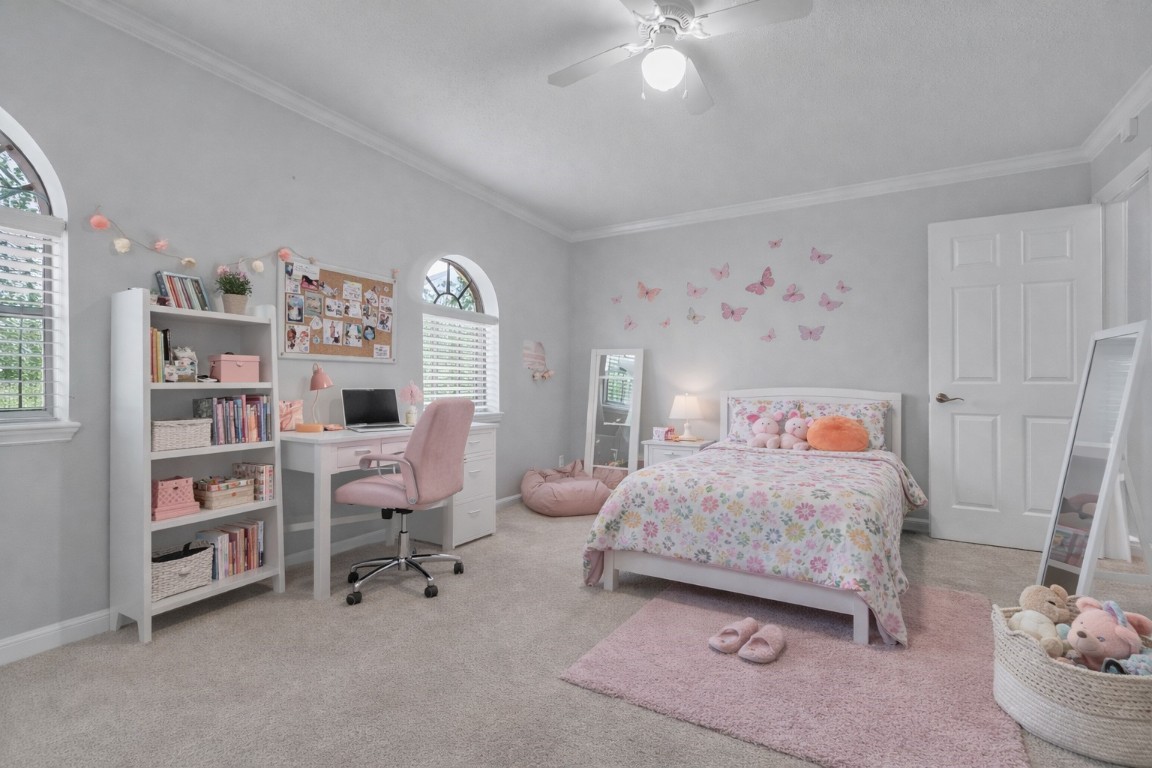 8723 Kennet Valley Road Spring, TX 77379 - Photo 26 of 38 a bedroom with a bed furniture and decor