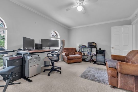 8723 Kennet Valley Road Spring, TX 77379 - Photo 27 of 38 a view of a livingroom with workspace and a window