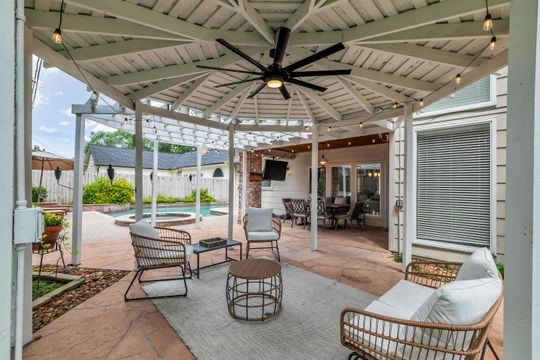 8723 Kennet Valley Road Spring, TX 77379 - Photo 28 of 38 a outdoor living space with patio furniture and a grill