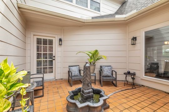 8723 Kennet Valley Road Spring, TX 77379 - Photo 30 of 38 a view of a porch with seating space