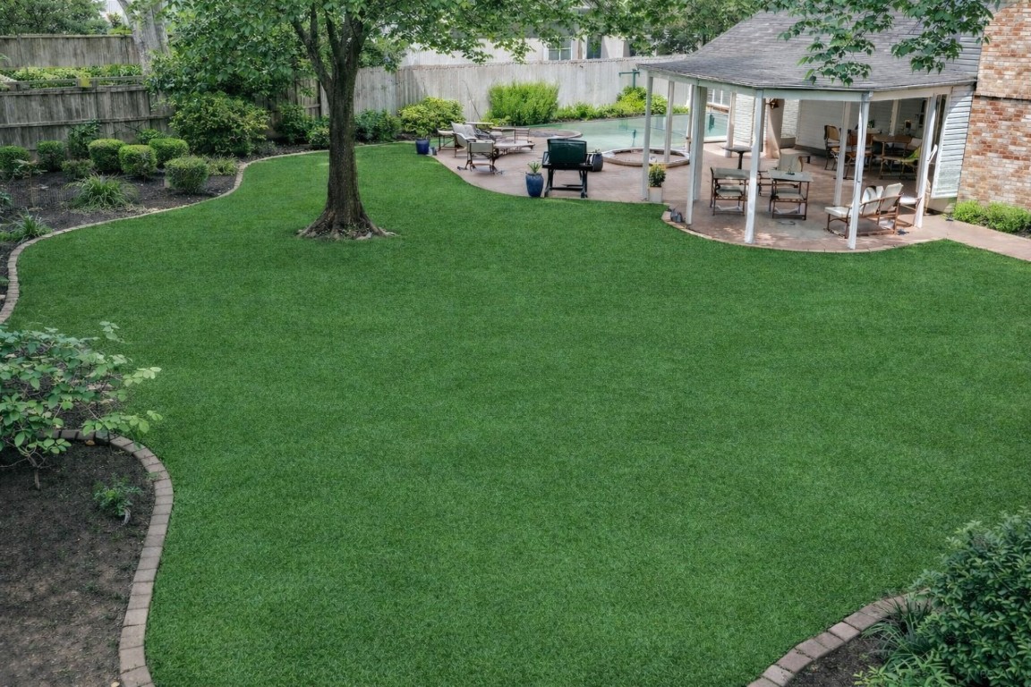 8723 Kennet Valley Road Spring, TX 77379 - Photo 3 of 38 a view of a chair and table in backyard