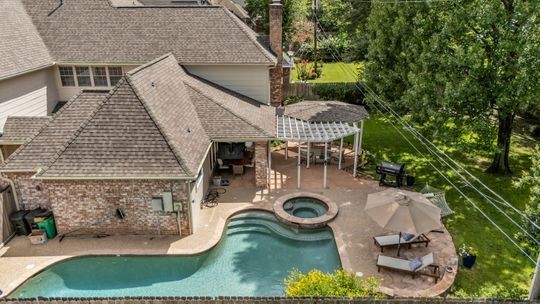 8723 Kennet Valley Road Spring, TX 77379 - Photo 31 of 38 an aerial view of a house with swimming pool and patio