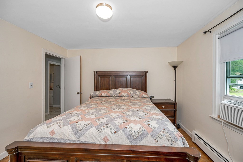 11 Cedar Circle Methuen, MA 01844 - Photo 12 of 38 a bedroom with a bed and a window