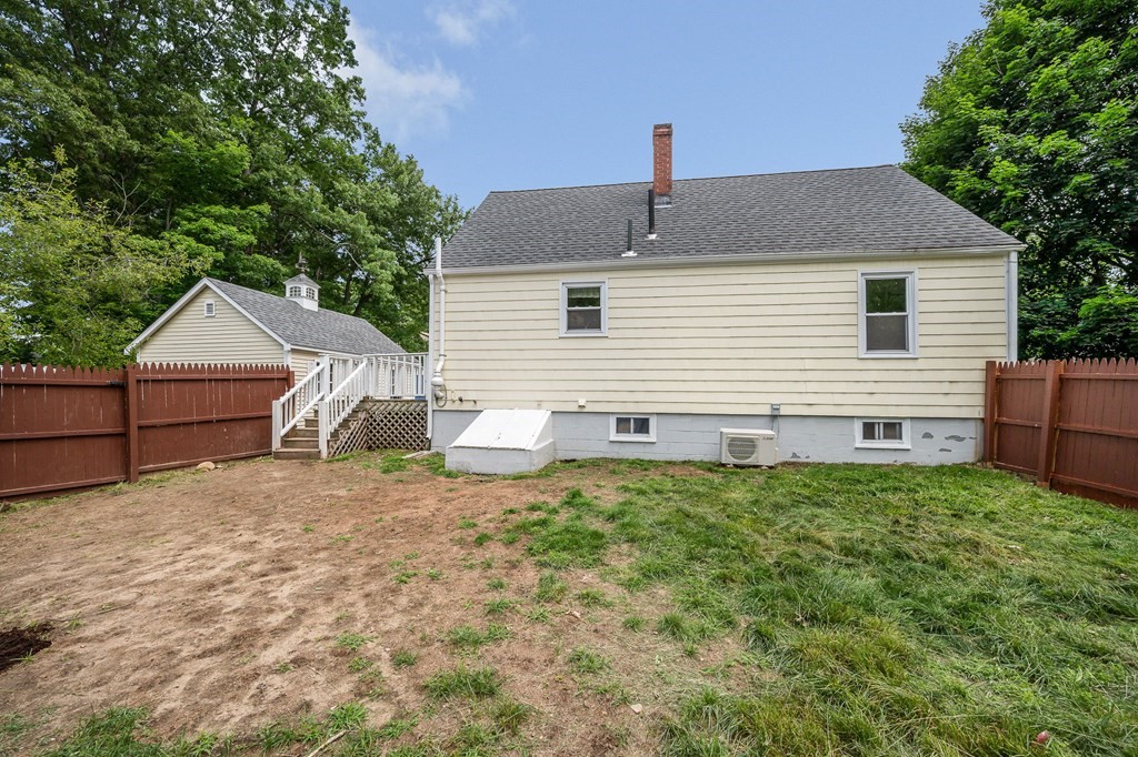 11 Cedar Circle Methuen, MA 01844 - Photo 26 of 38 a front view of a house with a yard