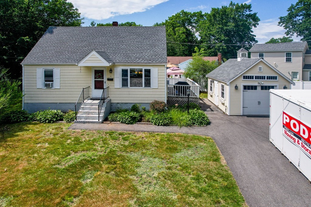 11 Cedar Circle Methuen, MA 01844 - Photo 30 of 38 a front view of a house with a yard
