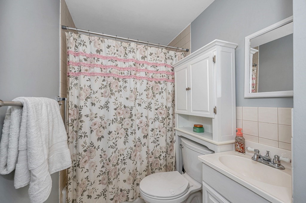 11 Cedar Circle Methuen, MA 01844 - Photo 10 of 38 a bathroom with a sink toilet and shower