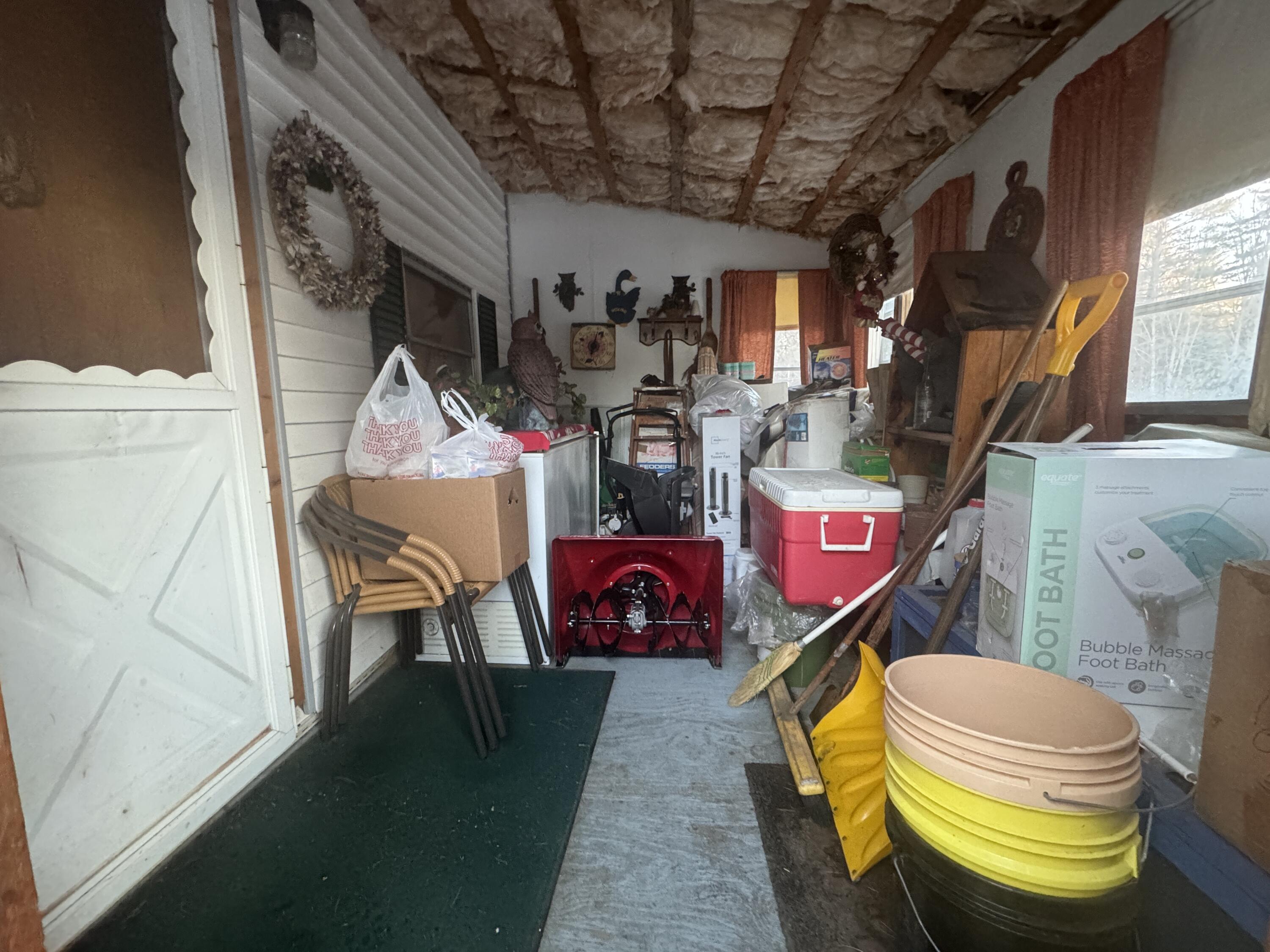 215 Embden Pond Road Anson, ME 04958 - Photo 12 of 14 Front enclosed porch