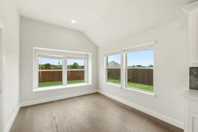 an empty room with entrance door