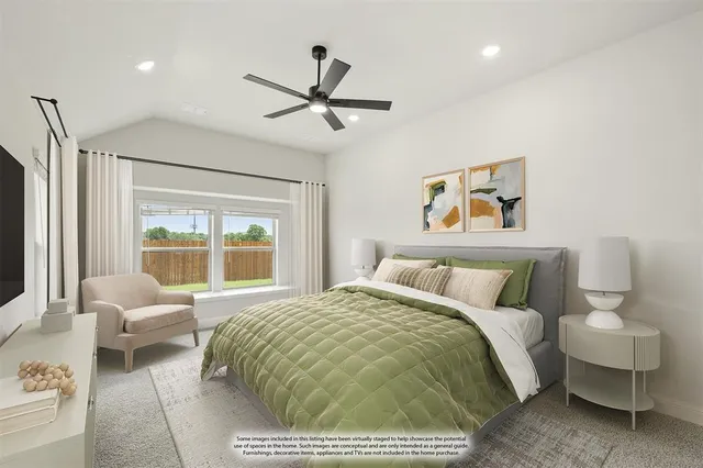 a bedroom with a large bed and a window