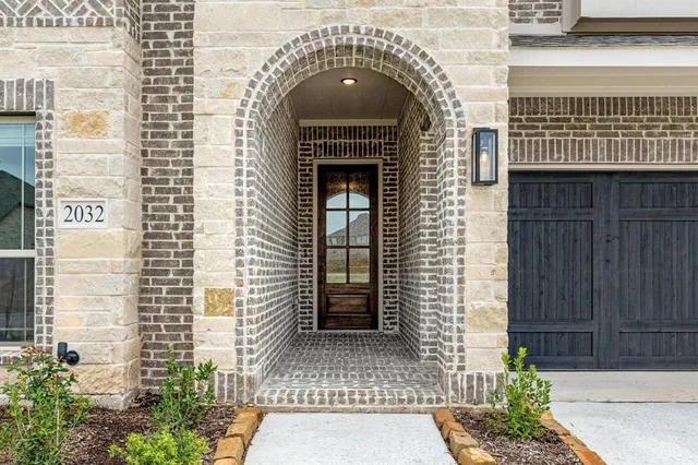 a front view of a house with a balcony