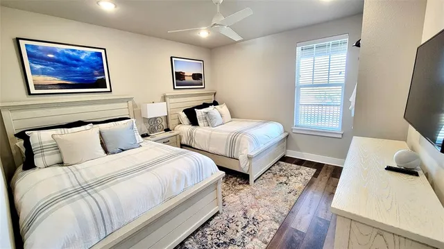 a bathroom with a sink toilet and shower curtain