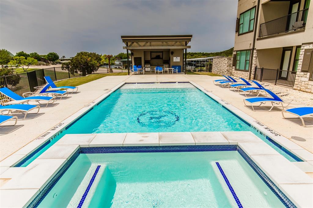 3412 Scenic Point Road, Unit 305 Graford, TX 76449 - Photo 21 of 37 Sparkling Pool and Hot Tub