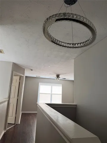 a view of a room with window and a sink