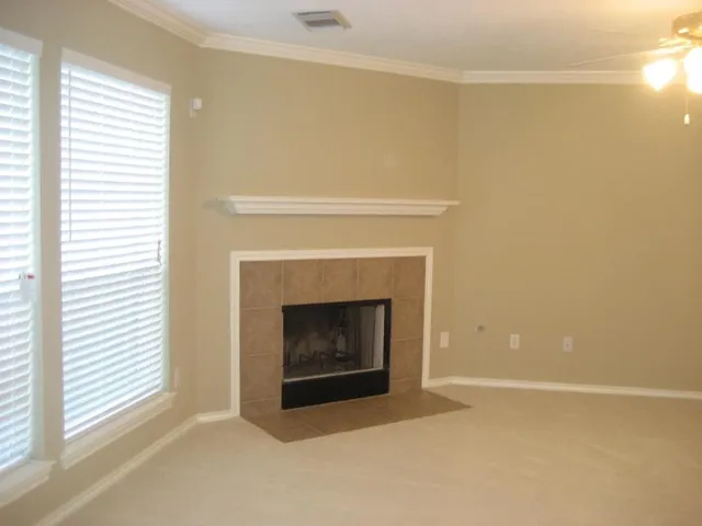a living room with a fireplace