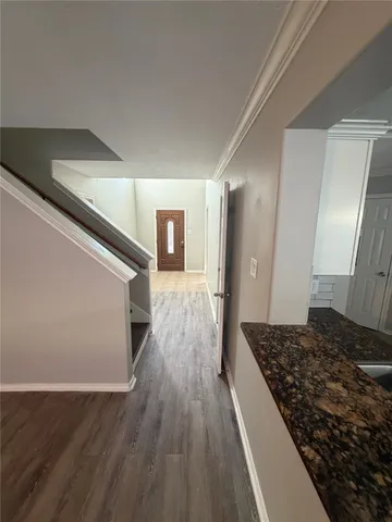 a living room with wooden floor