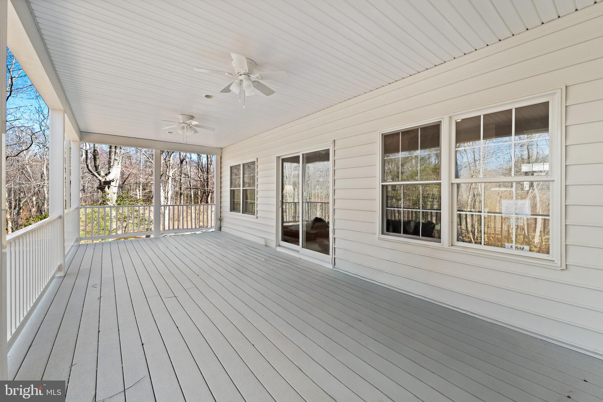 6380 Mallard Lane Lothian, MD 20711 - Photo 29 of 57 a view of an empty room with wooden floor and a window