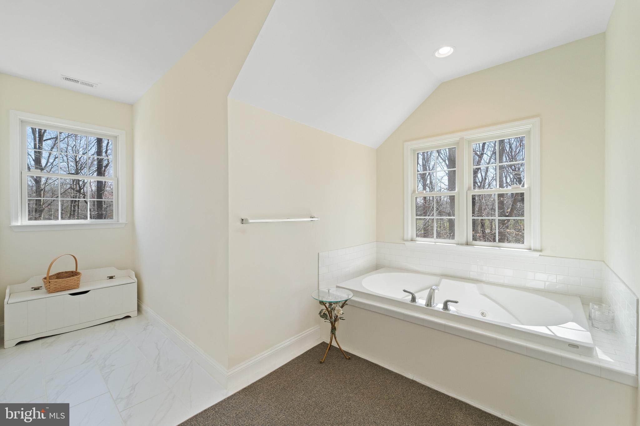 6380 Mallard Lane Lothian, MD 20711 - Photo 33 of 57 a bathroom with a bathtub and a window